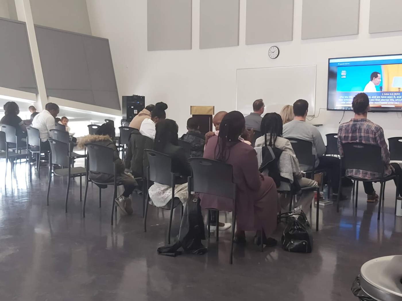 Congregation watching Pastor Chris at Healing Streams Live